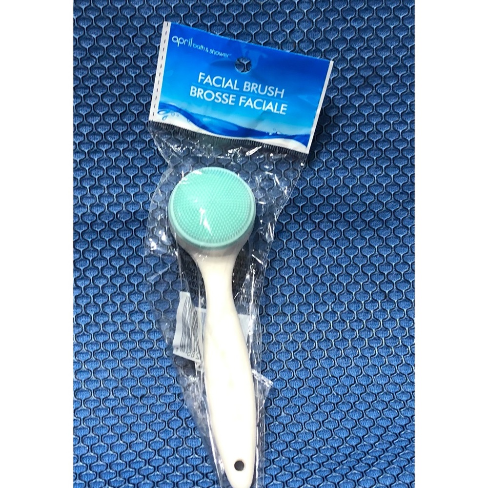 Facial brush green.